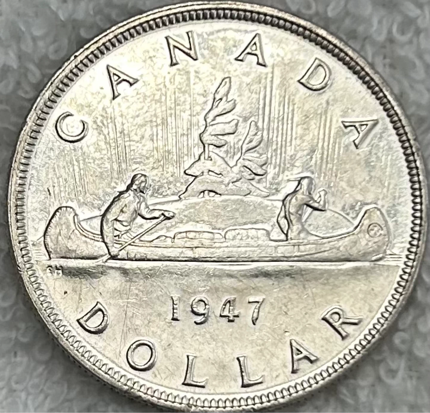 Rare 1947 Pointed 7 with Dot Canadian Silver Dollar MS ++