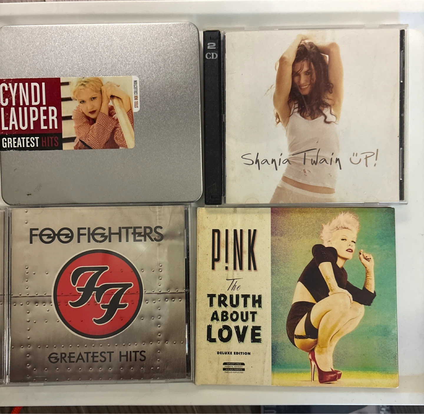 Collection of 4 greatest hits CDs