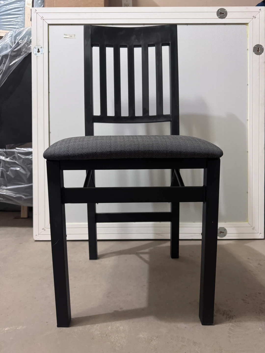Black Folding Chair with Grey Fabric Seat