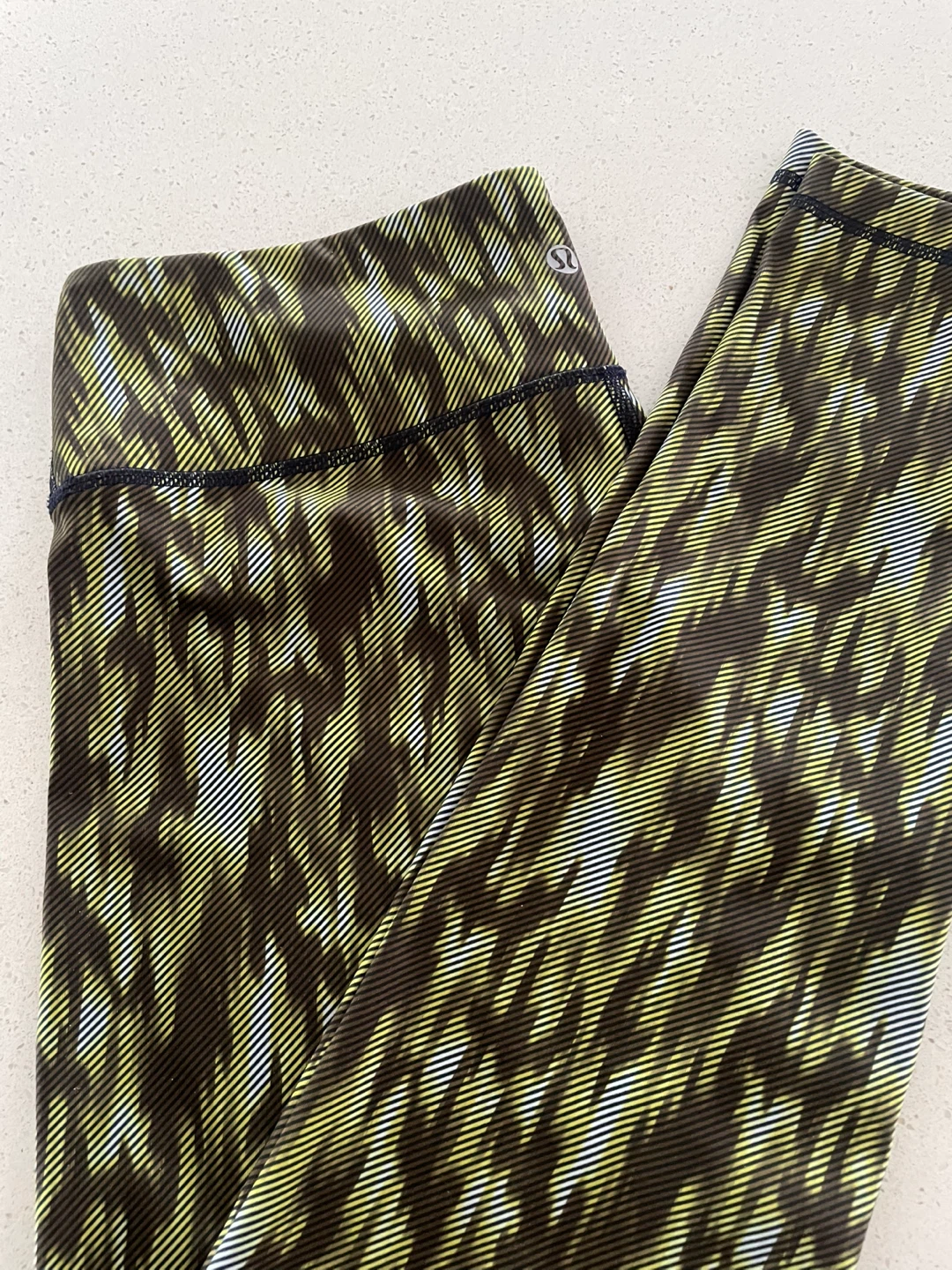 Lululemon Women's Leggings size 10-12Green/Black Abstract Print