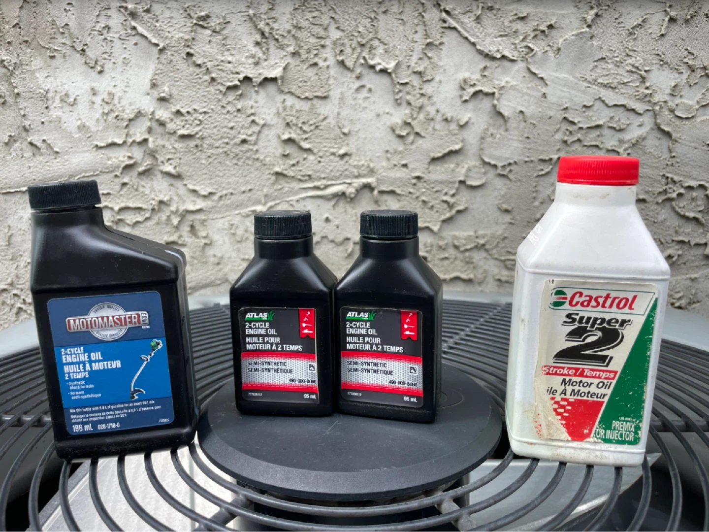 Motomaster, Atlas, and Castrol 2-Cycle Engine Oil