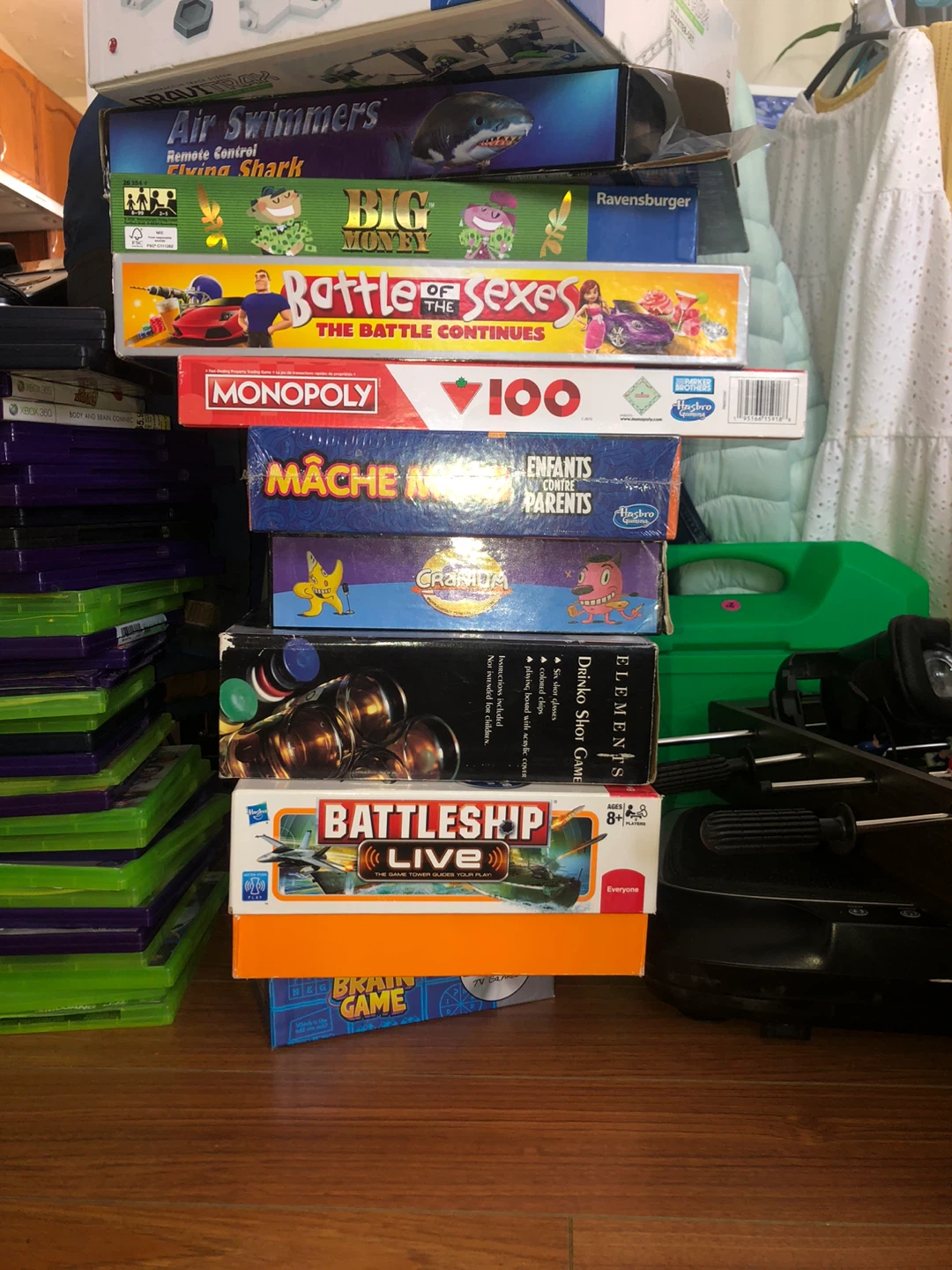 TOWER of Assorted Board Games and Remote Control Shark
