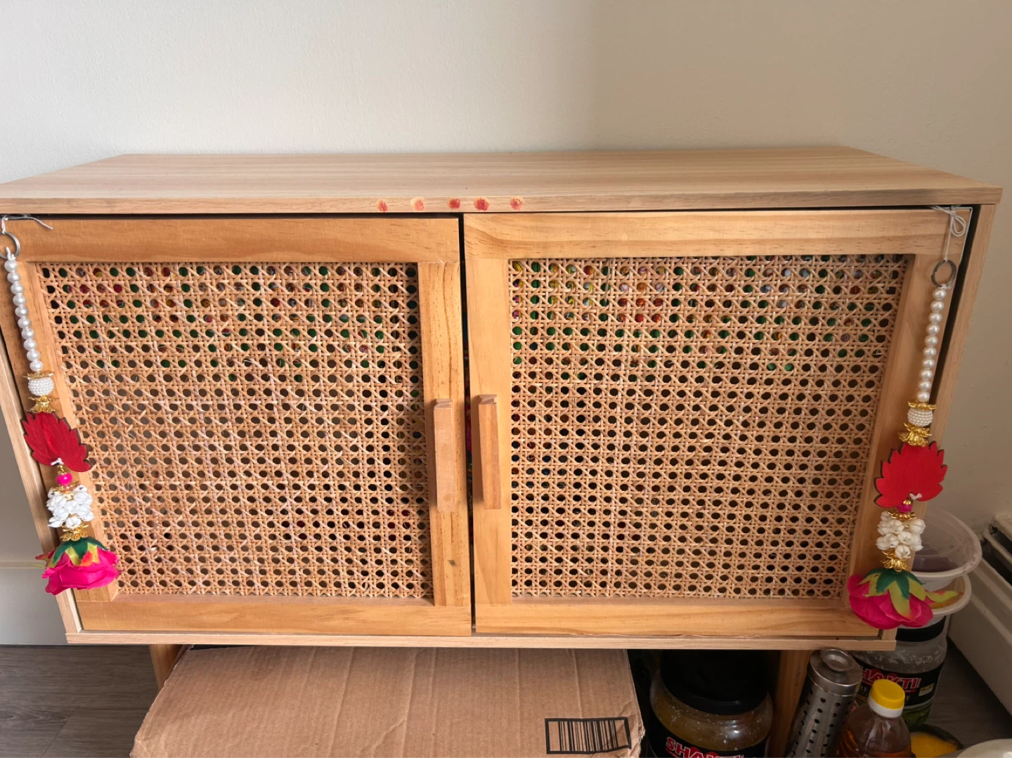 Wooden Cabinet with Cane Doors