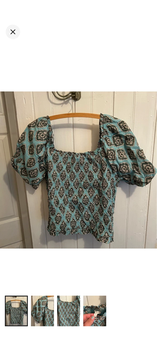 Teal patterned smocked puff sleeve top