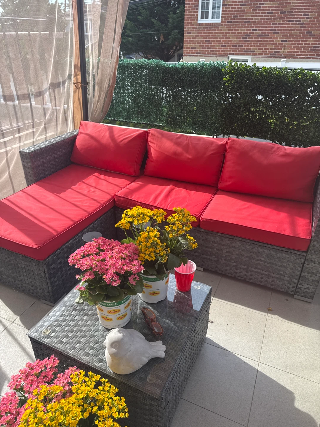 Outdoor Sectional Sofa with Red Cushions