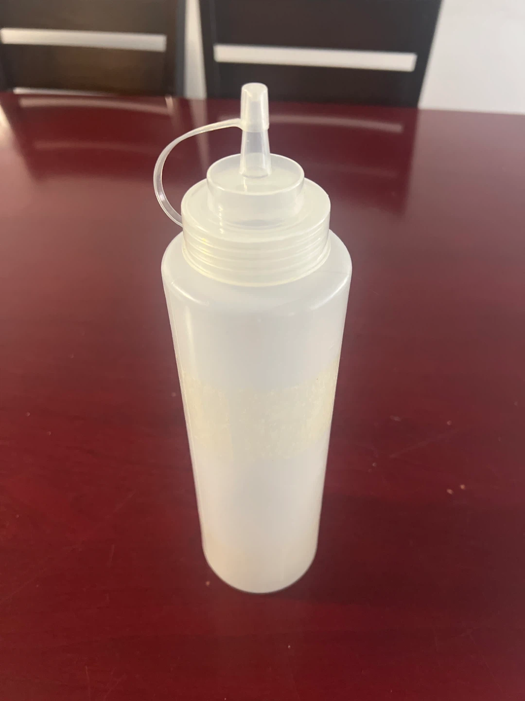 Clear Squeeze Bottle with Red Cap