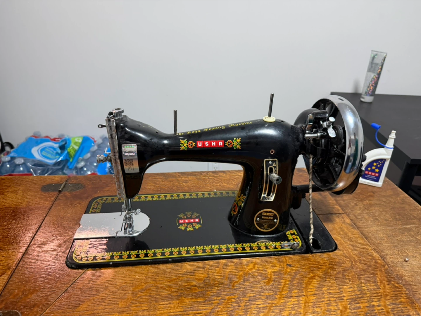 USHA Hand Crank Sewing Machine and vintage singer sewing table