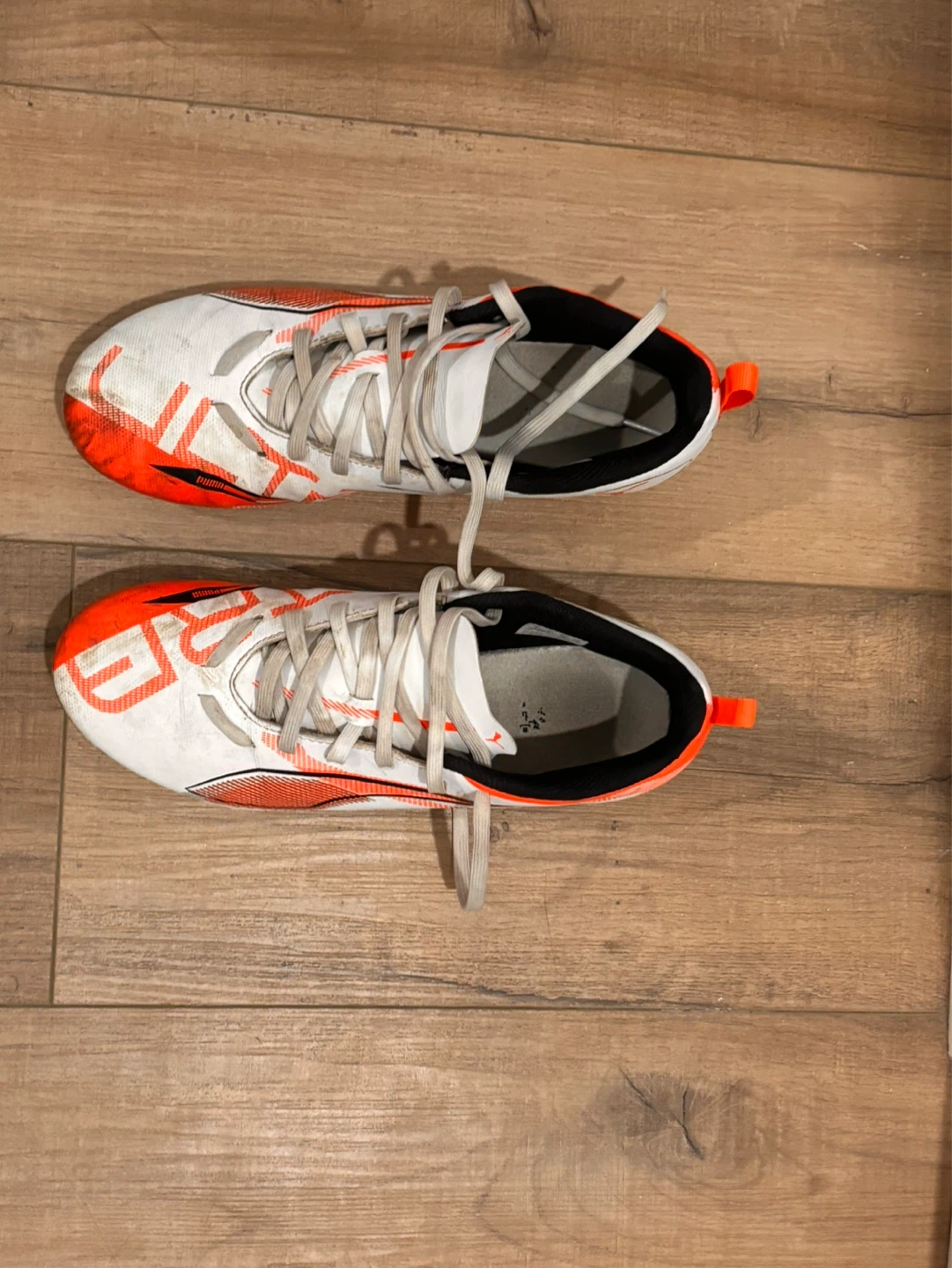 Puma White and Orange Soccer Cleats