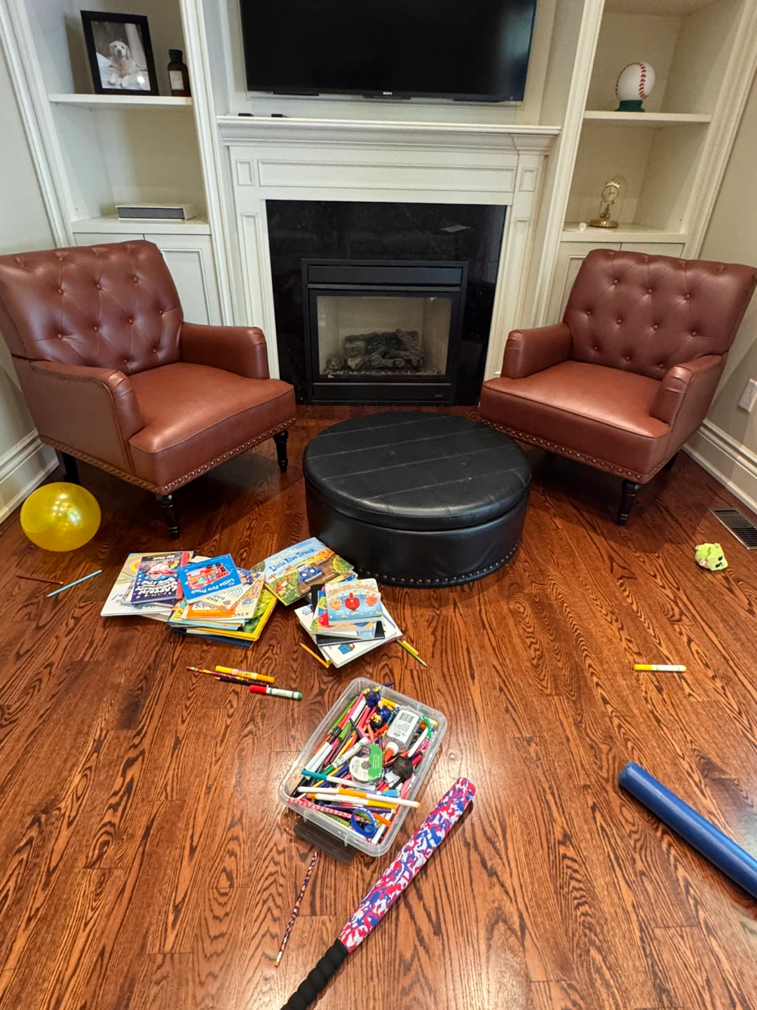 2 Studded Arm Chairs and Black storage ottoman