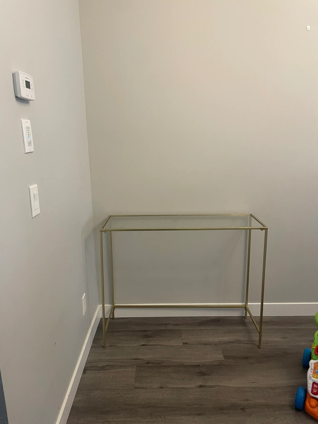 Glass top console table with gold frame - photo 2