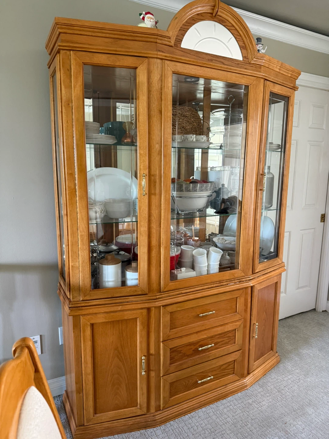 Wooden china cabinet with glass doors