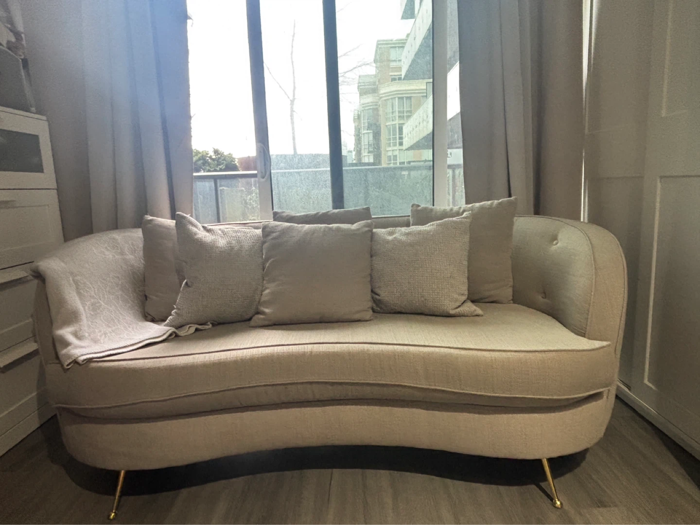 Curved Sofa with Gold Legs