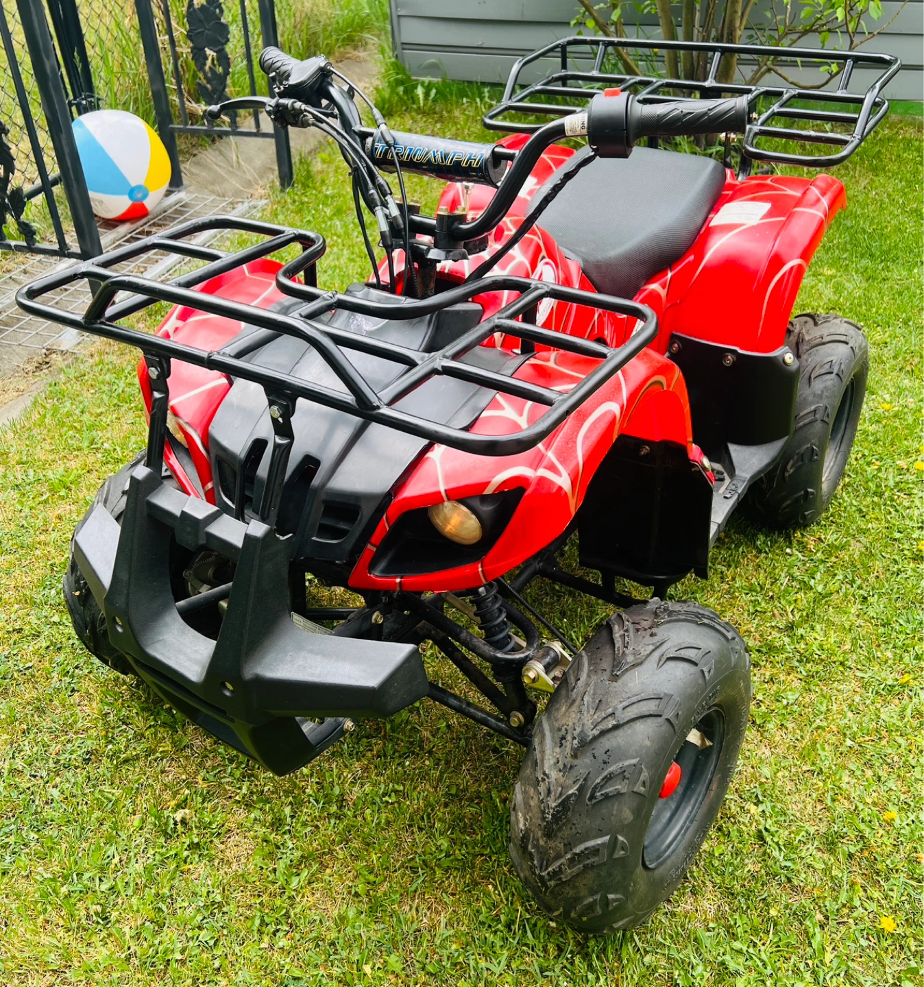 Red Kids ATV with Spider Web Design