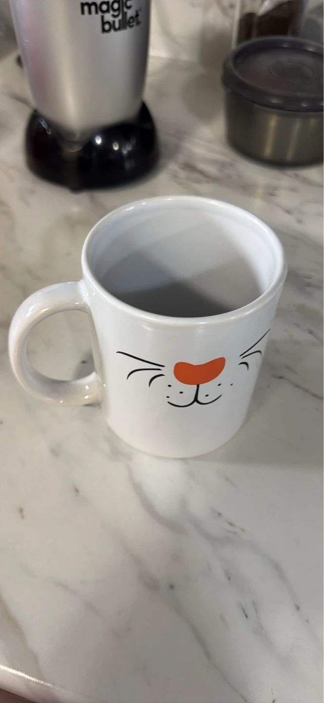 White Mug with Cat Face Design