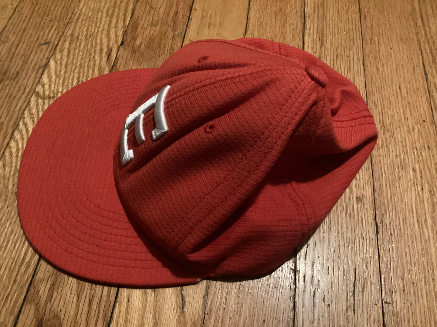 Red Baseball Cap with White 'E' Logo