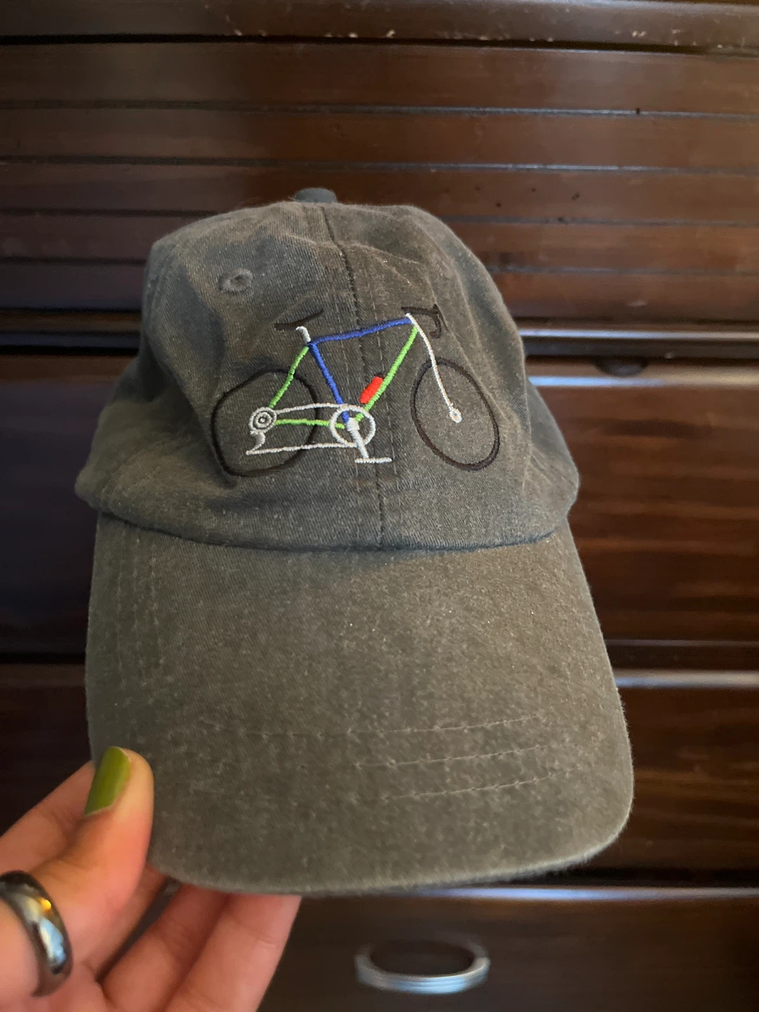 Grey Baseball Cap with Embroidered Bicycle Design