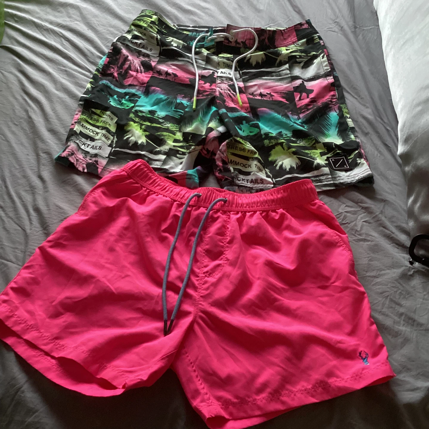 Two Pairs of men’s size med Swim Trunks