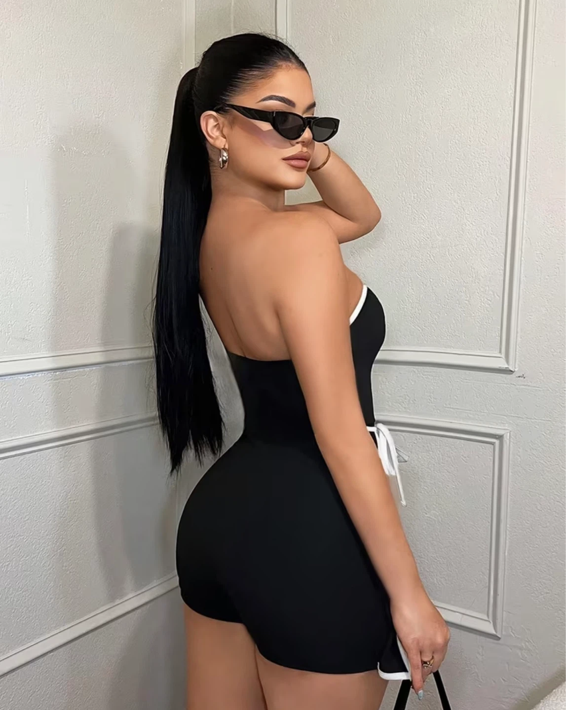 Black strapless romper with white trim. Size xsmall - photo 2