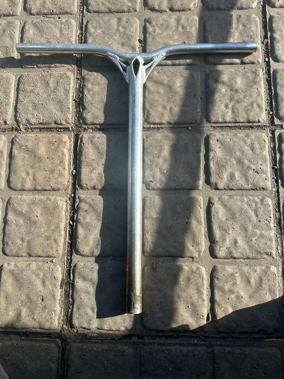 Tilt scooter clamp and reaper bars