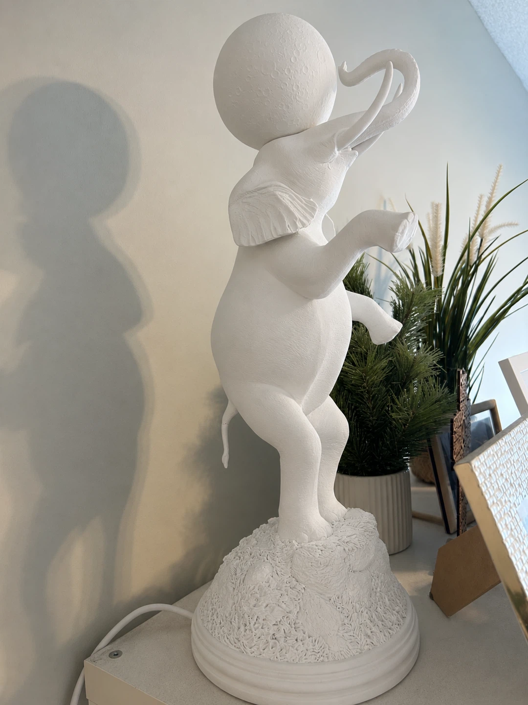 White Elephant Statue with Ball