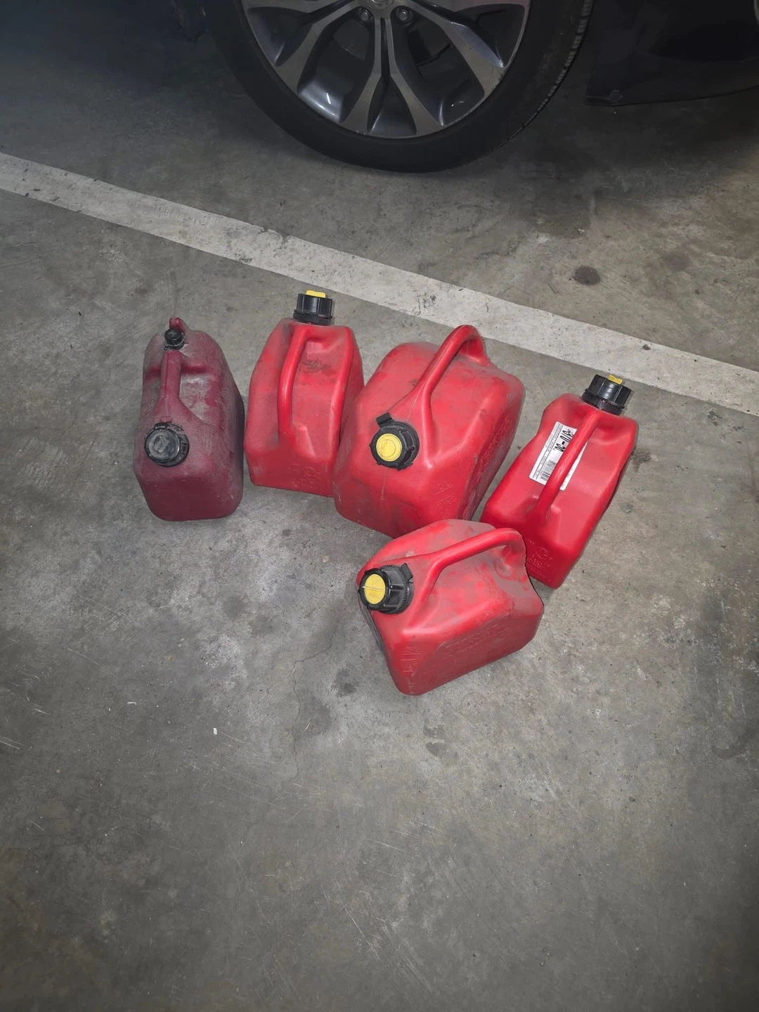 Set of 5 Red Plastic Gas Cans