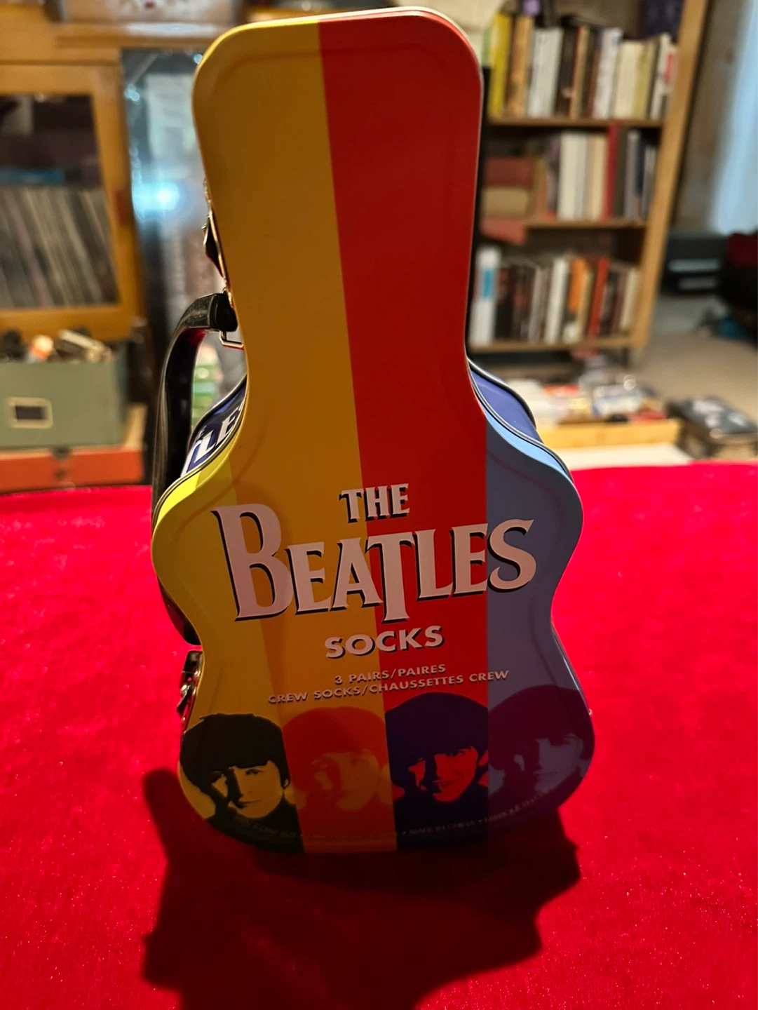 Beatles guitar-shaped tin