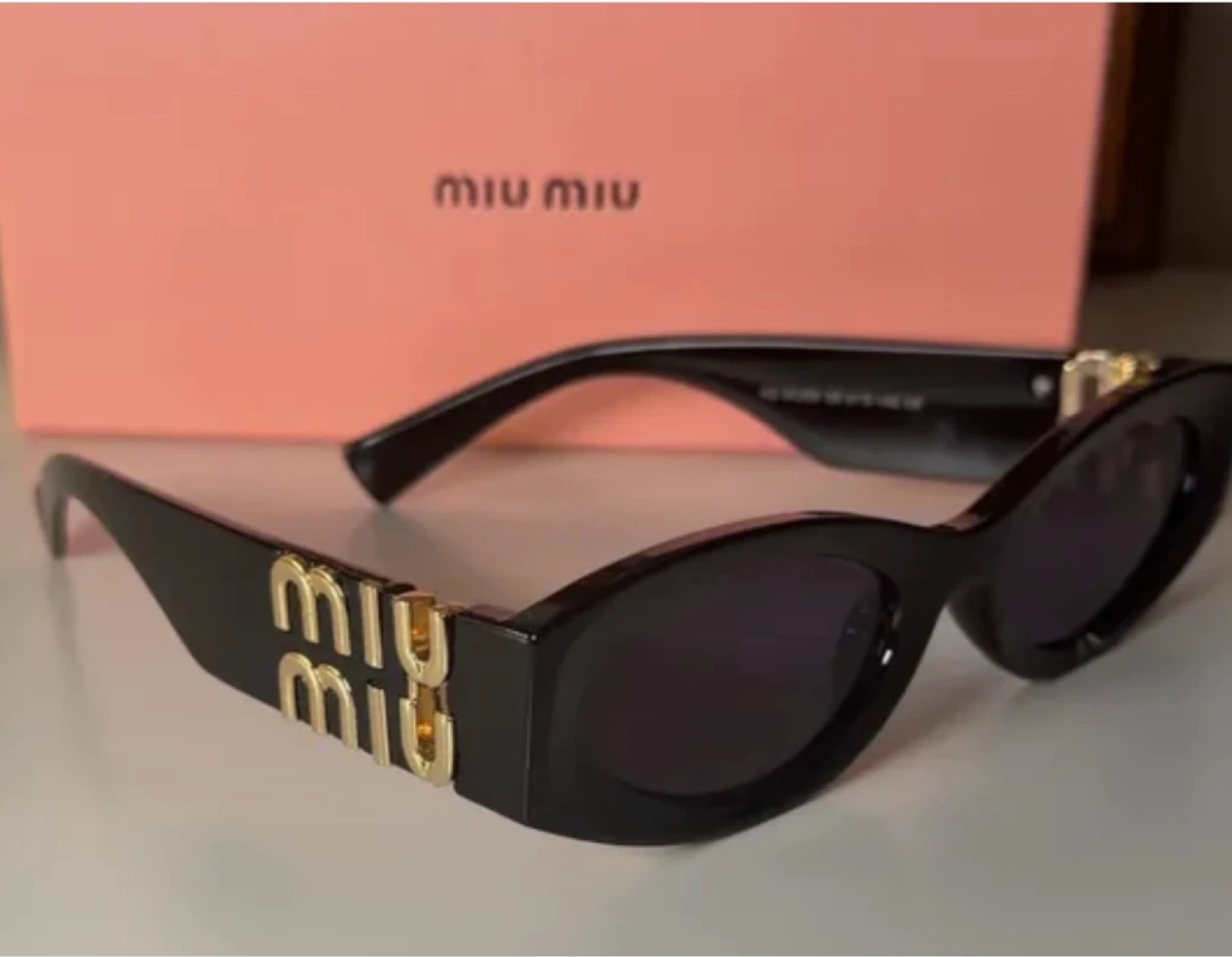 Miu Miu Black Cat-Eye Sunglasses