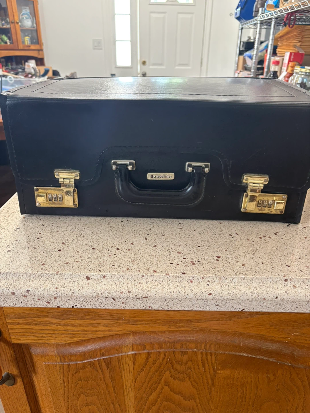 STRADELLINA BLACK LEGAL SIZE LEATHER ROLLING ATTACHE CASE