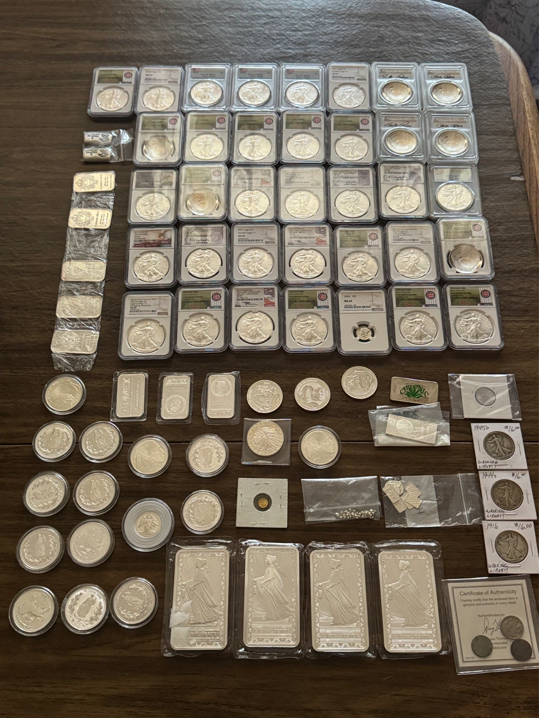 Collection of Silver Coins and Bars