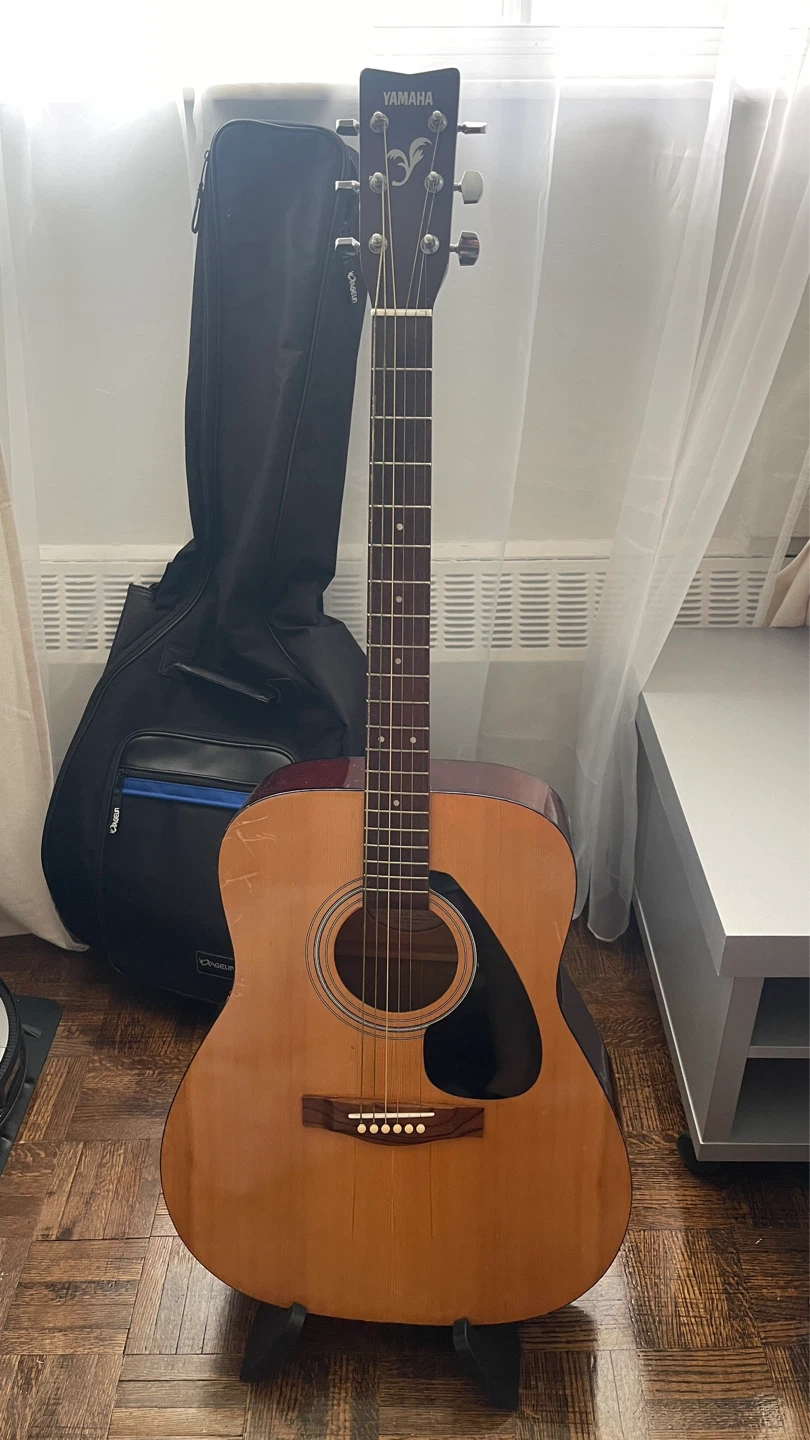 Yamaha acoustic guitar with FREE Strap, Case and Stand