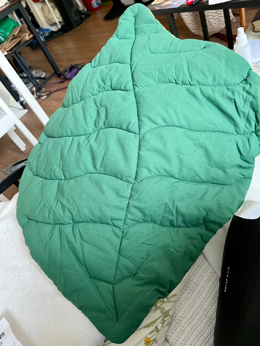 Green leaf-shaped pet mat for small breed dogs