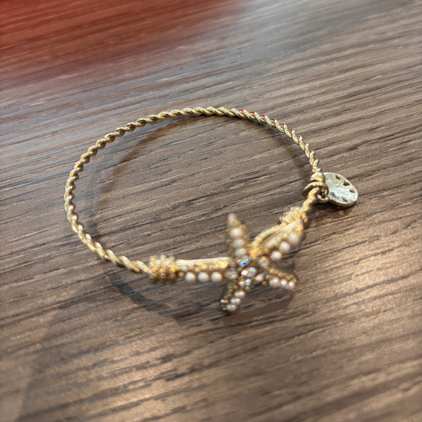 Gold tone starfish bracelet with pearl and rhinestone accents - photo 2