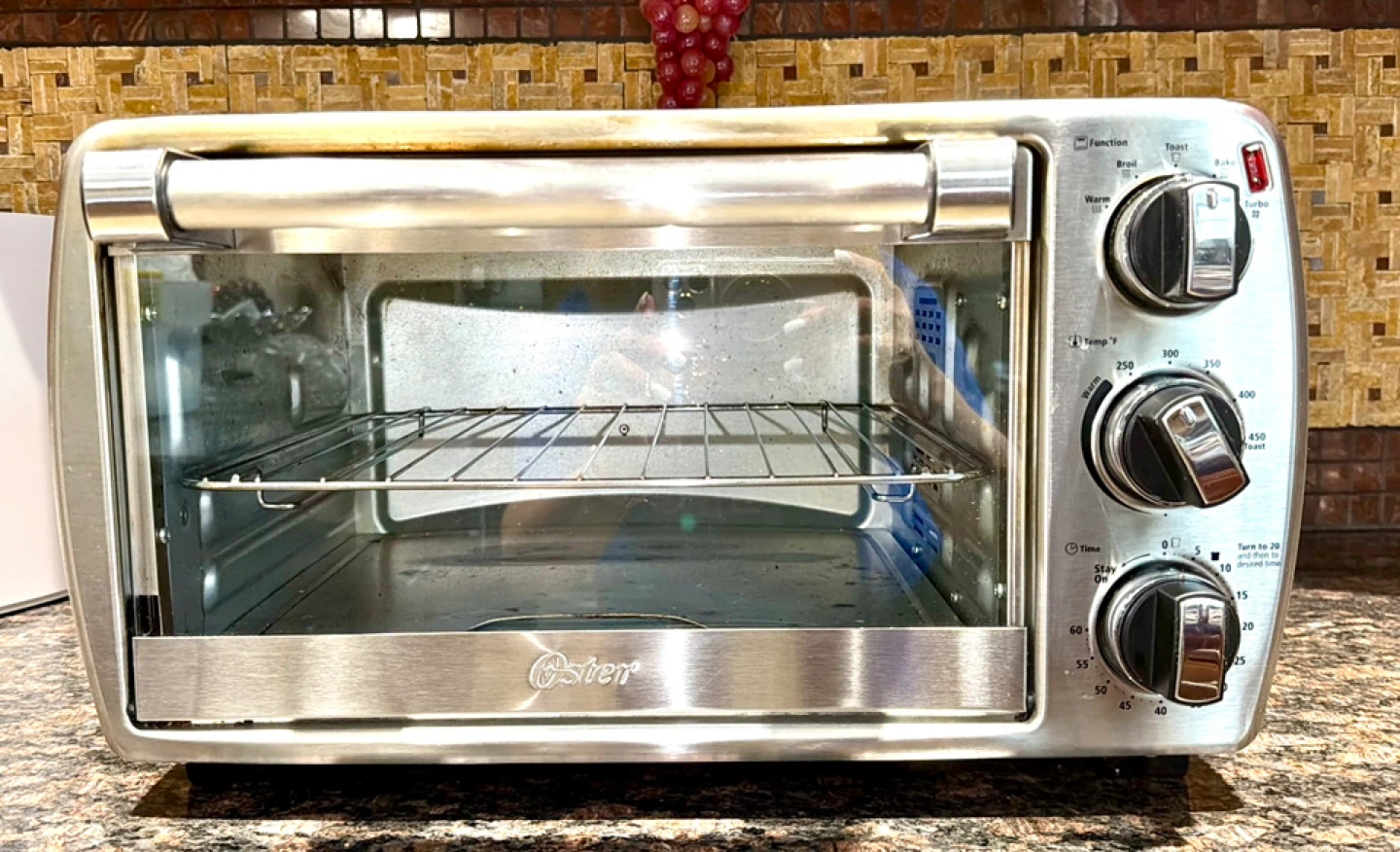 Oster 6 Slice Countertop Oven/Turbo Convection-.