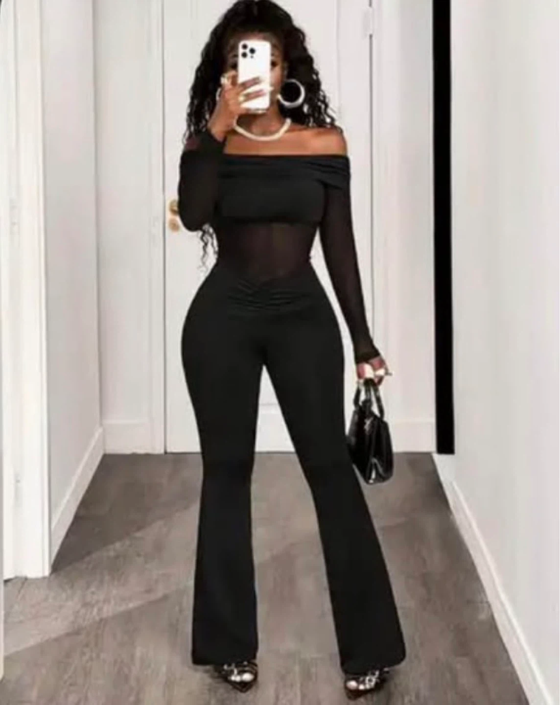 Black Off-the-Shoulder Jumpsuit with sheer cutouts. Size large