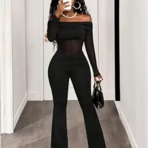 Black Off-the-Shoulder Jumpsuit with sheer cutouts. Size large