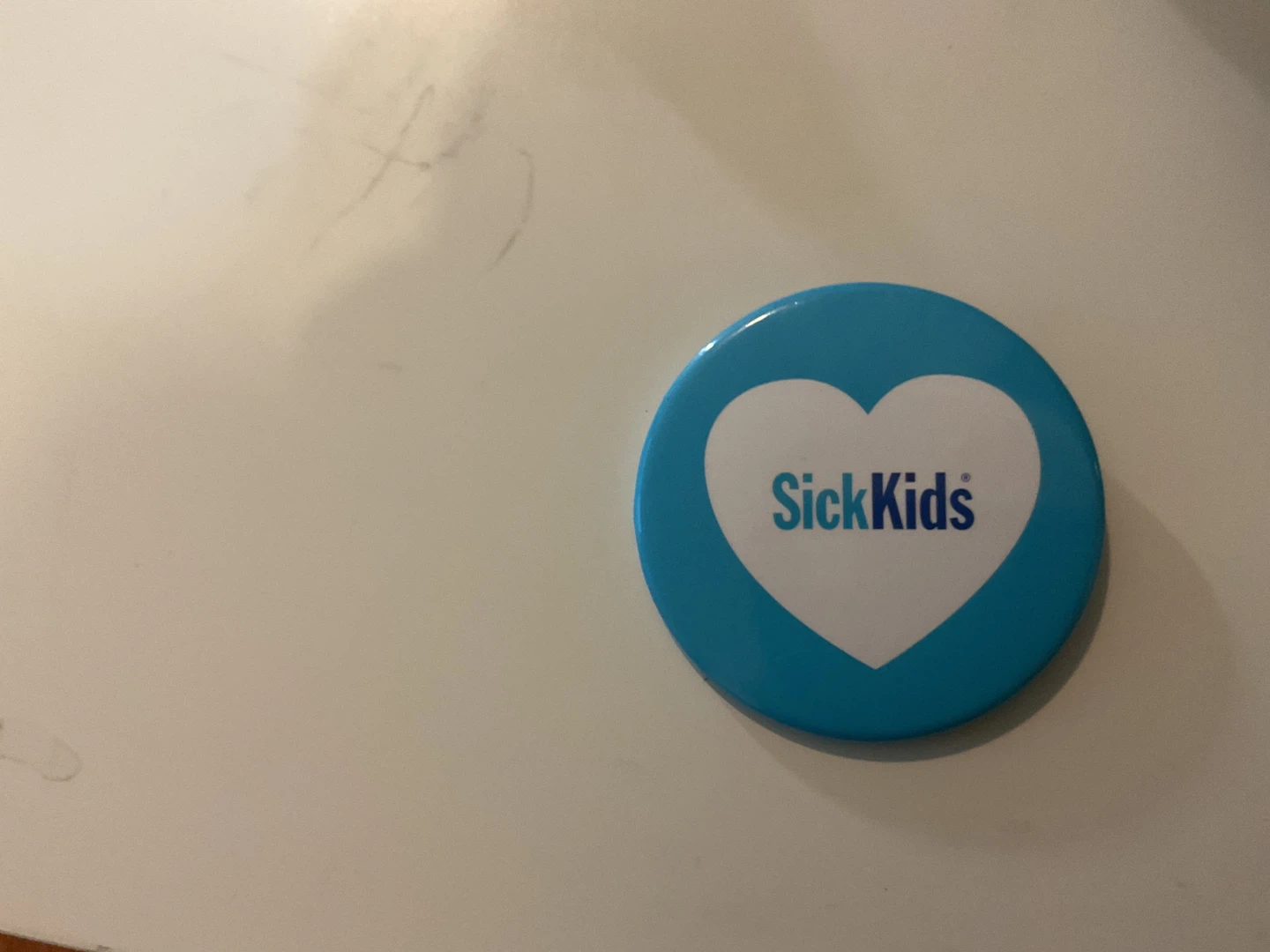 Sick kids pin
