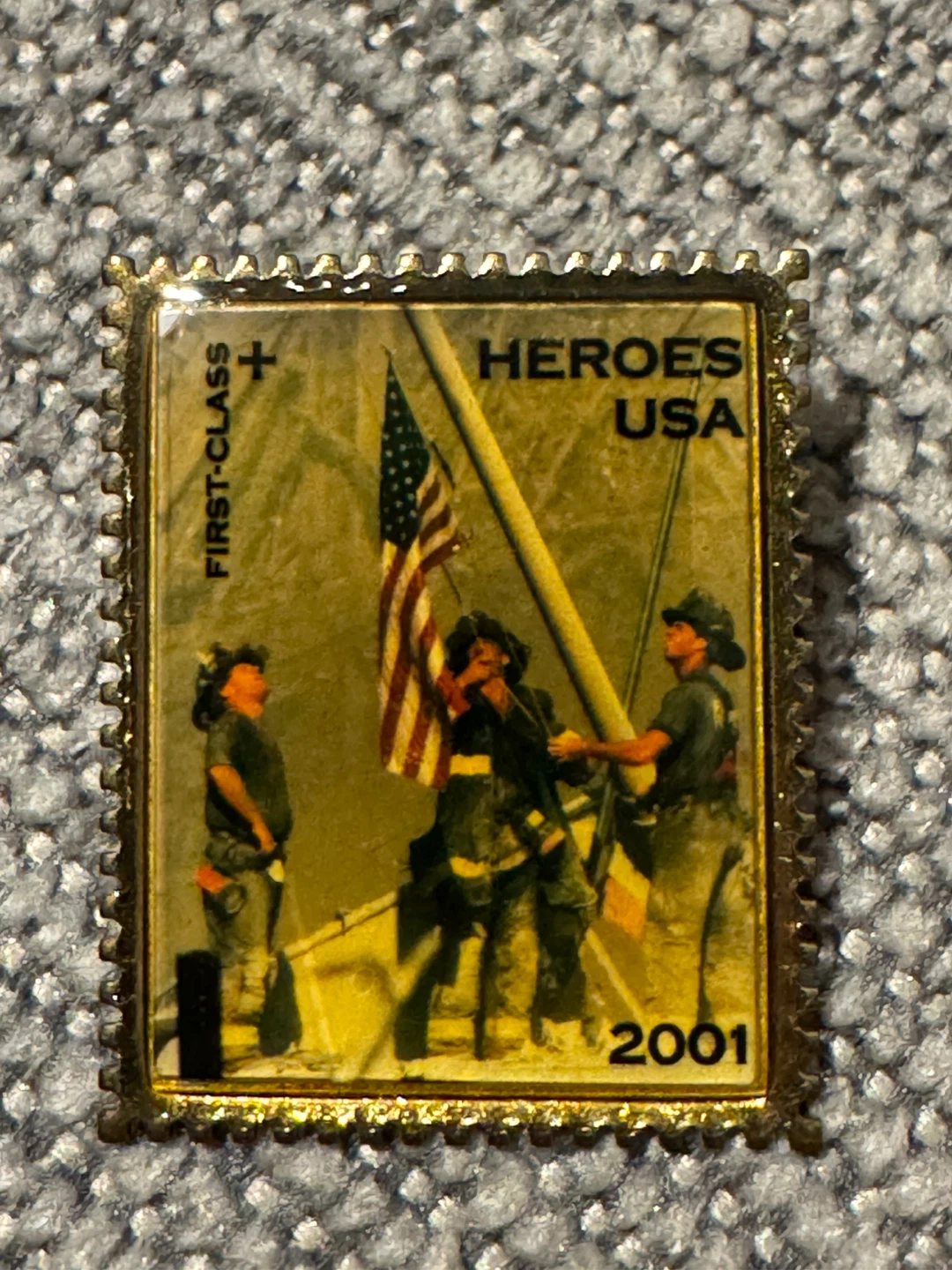 First class heros pin