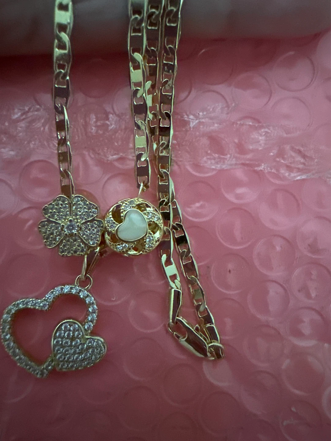 Gold  laminated Necklace with Charms - photo 2