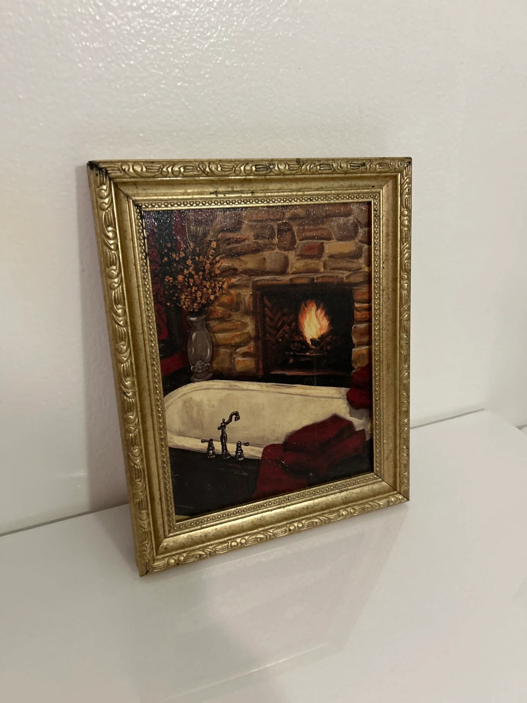 Framed Painting Print of a Bathtub by a Fireplace