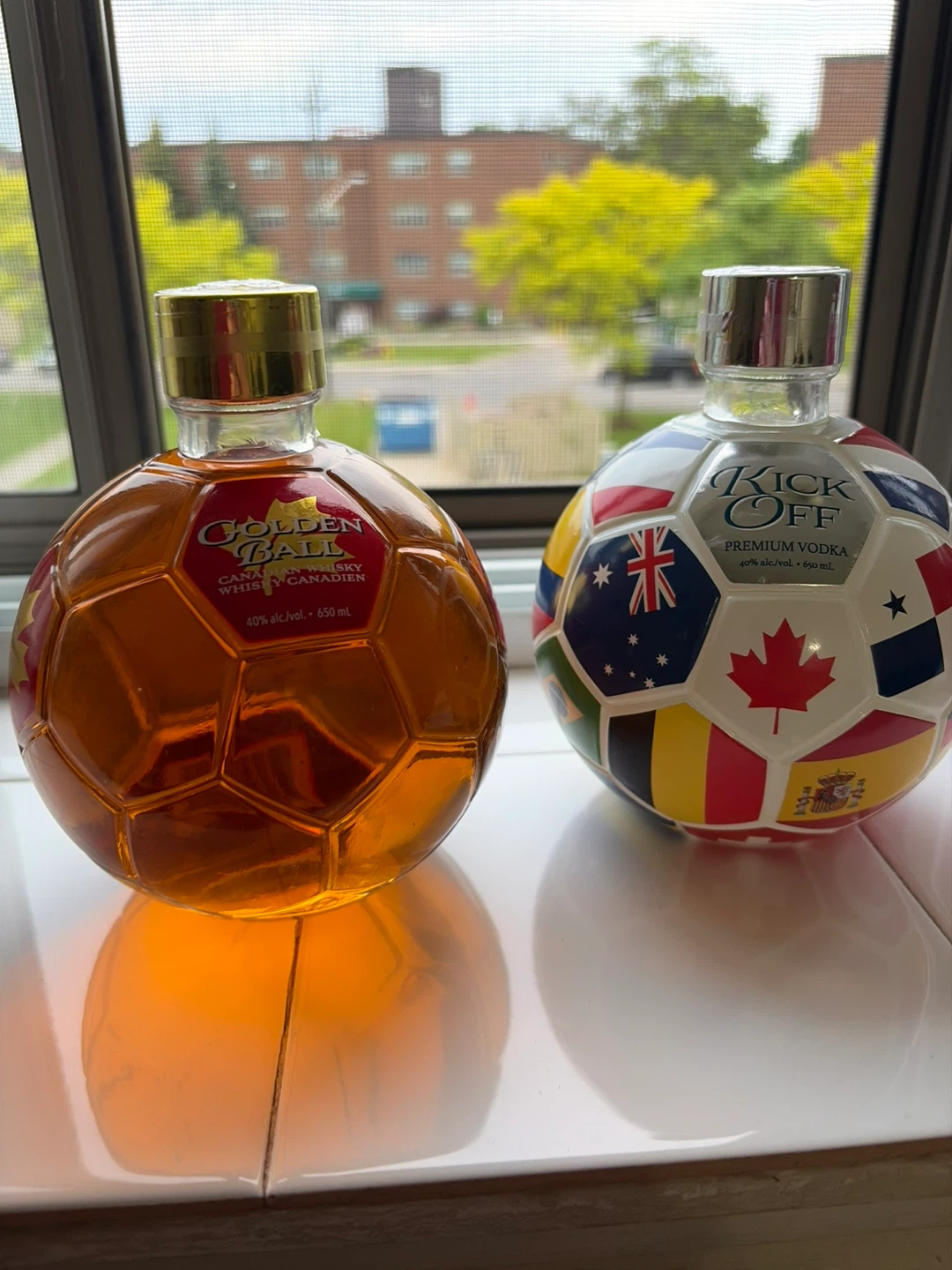 Fifa Golden Ball Canadian Whisky and Kick Off Premium Vodka each