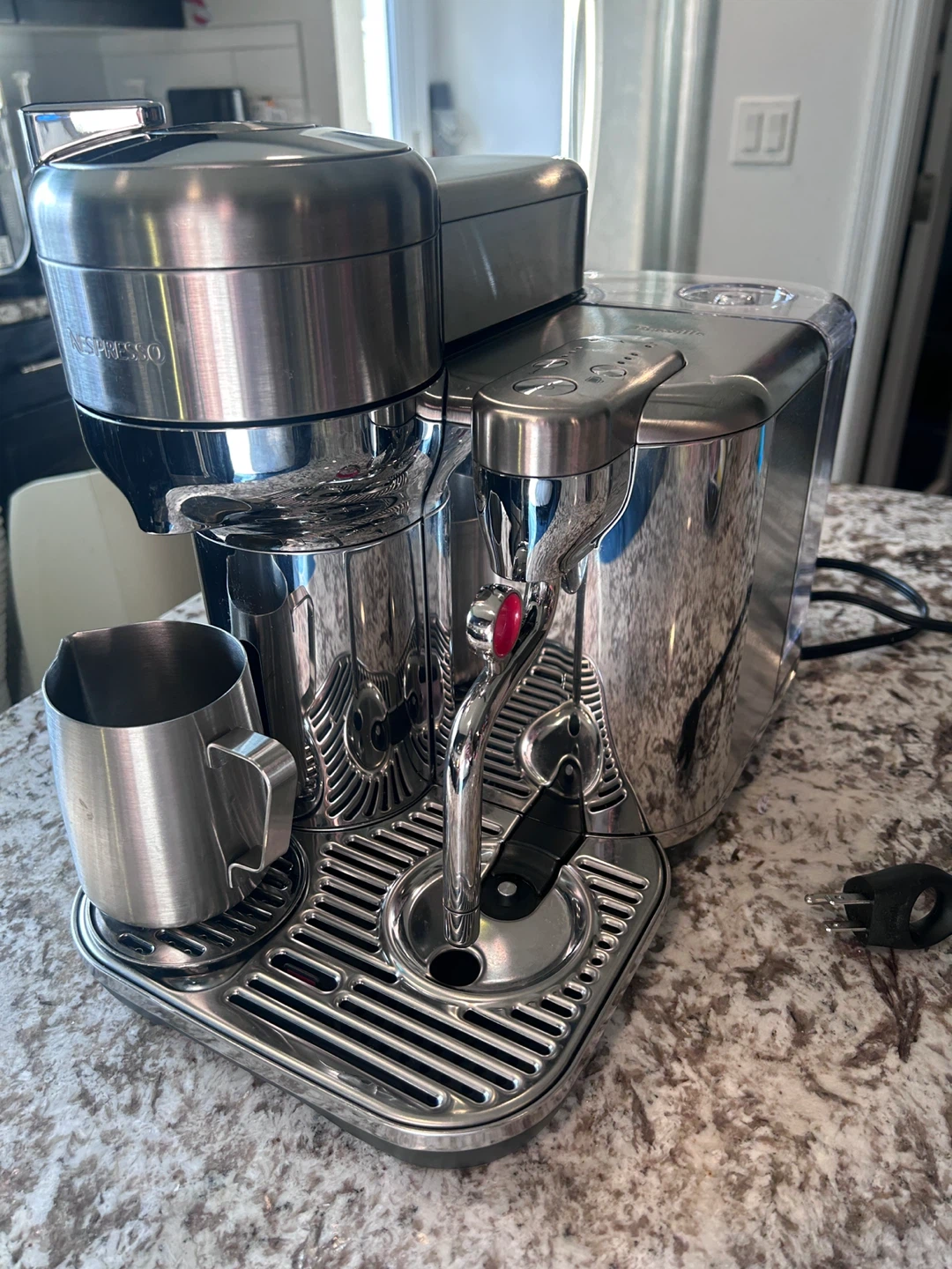 Nespresso VertuoPlus Coffee Machine with accessories and coffee