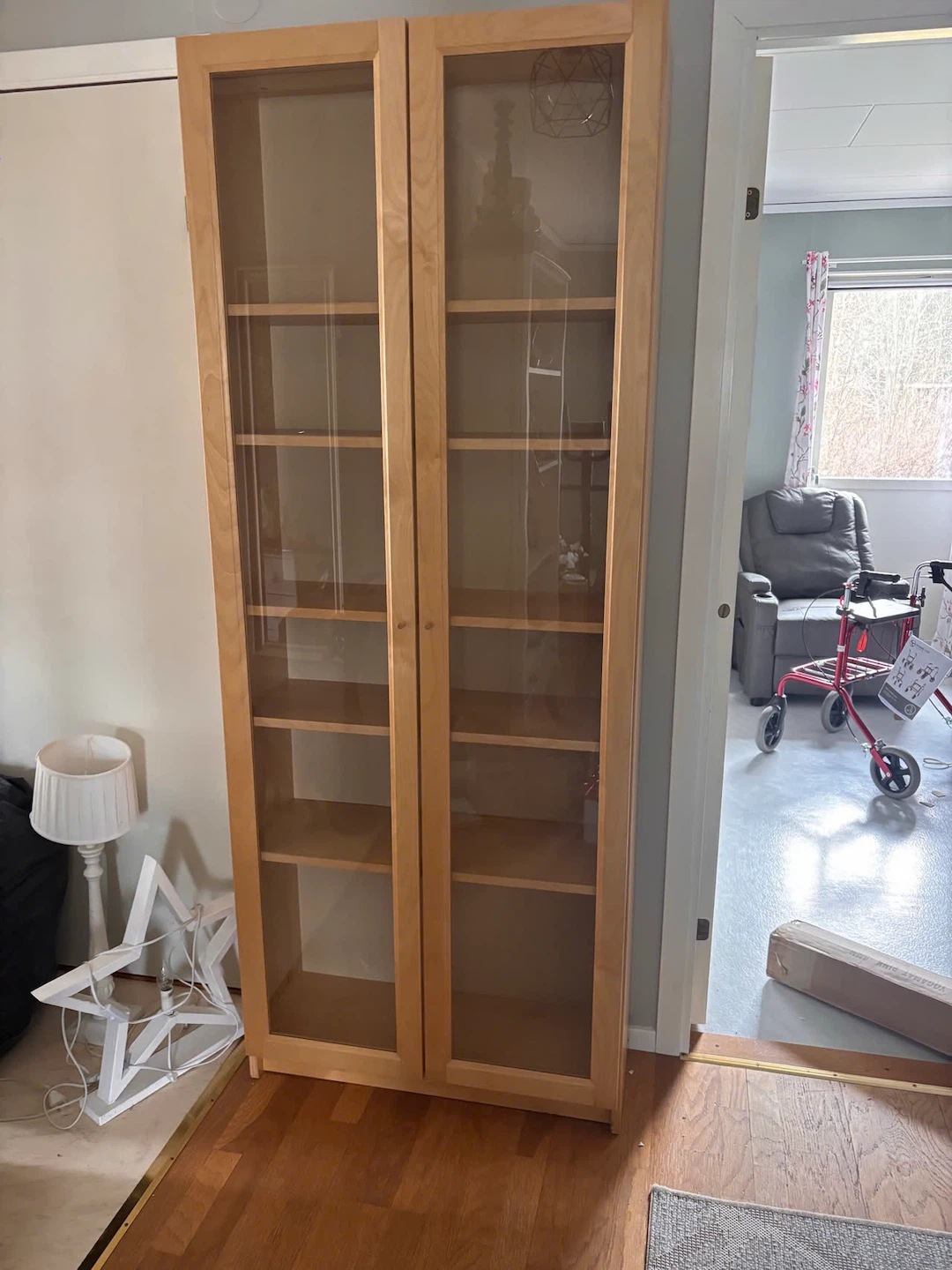 IKEA Billy bookcase with glass doors yellow colour