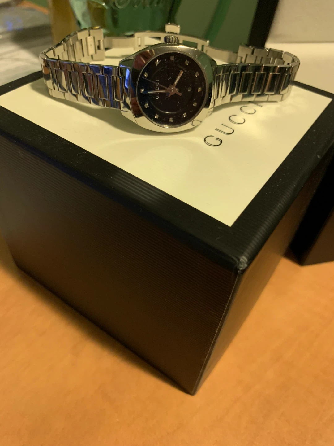 Gucci Stainless Steel Watch with diamond markers and day display