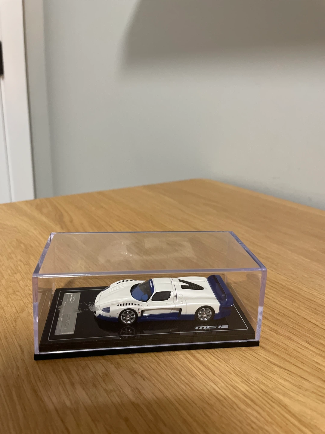 White and Blue Model Car TRC 12 in Display Case