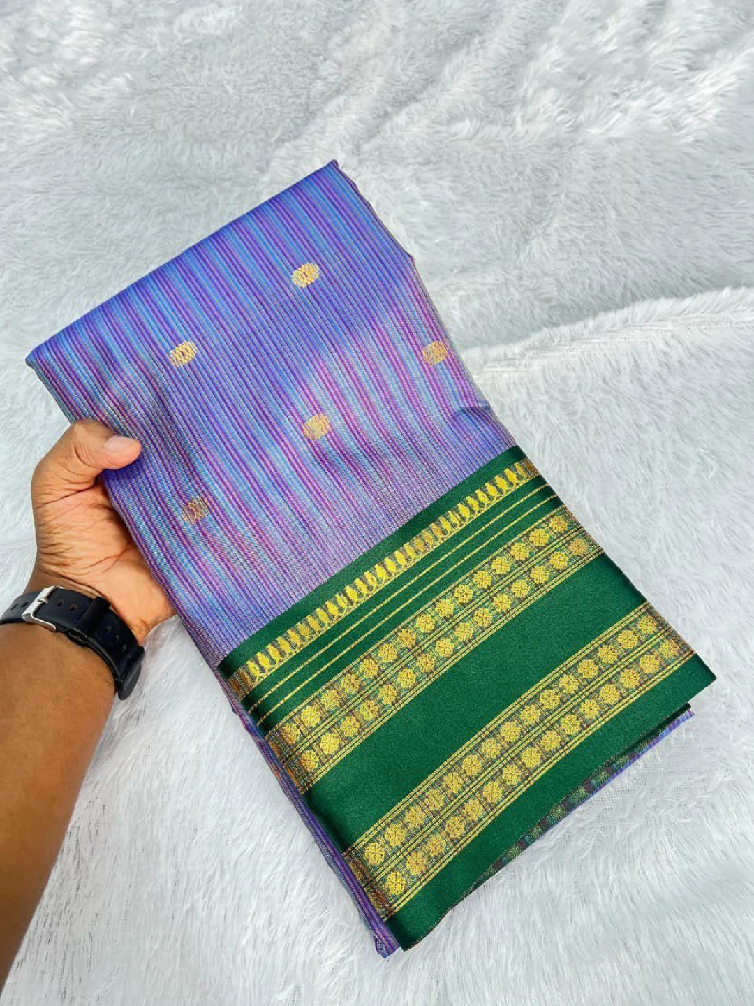 Purple and gold striped saree