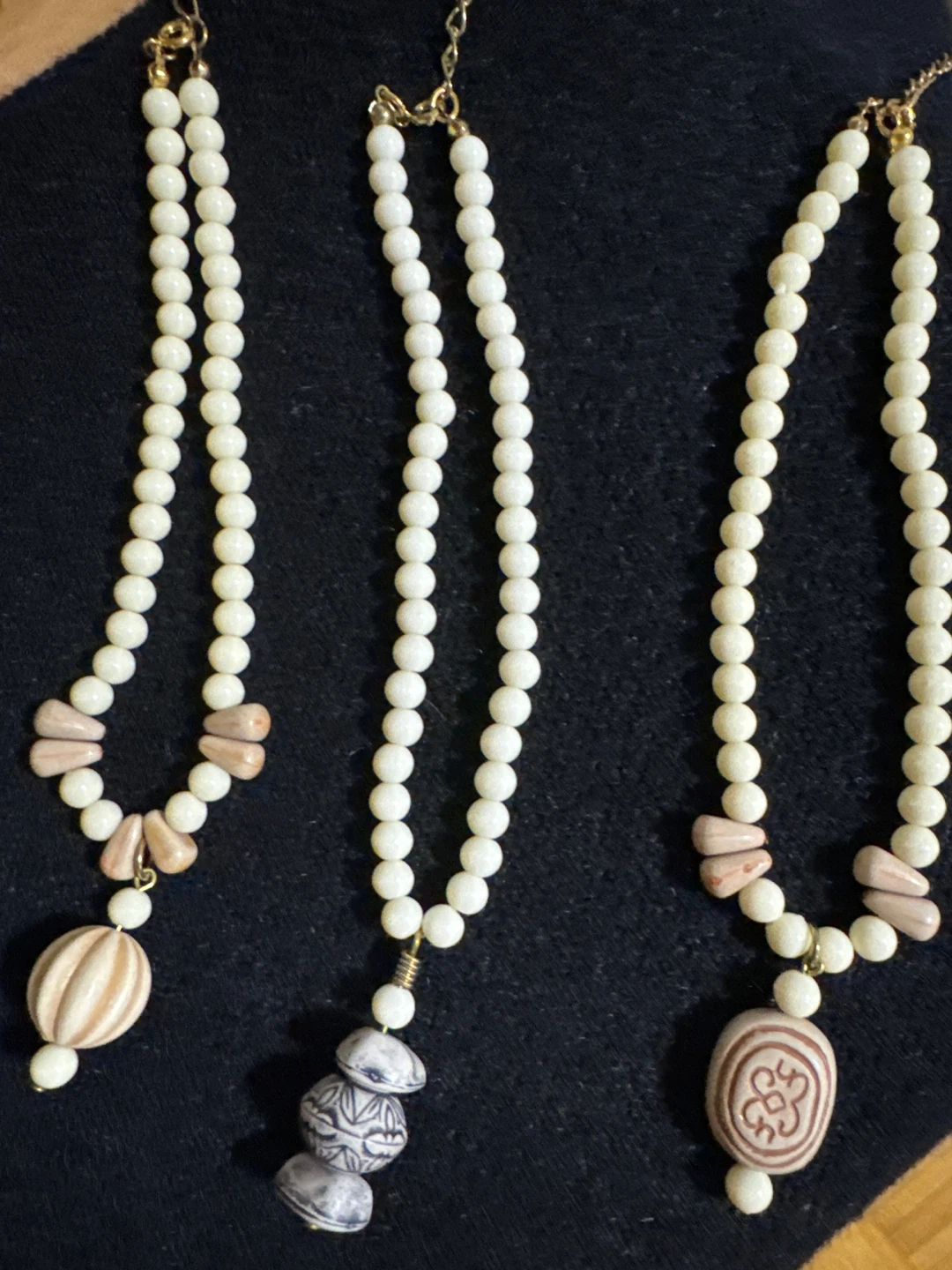 Gold tone costume jewelry earrings and necklaces