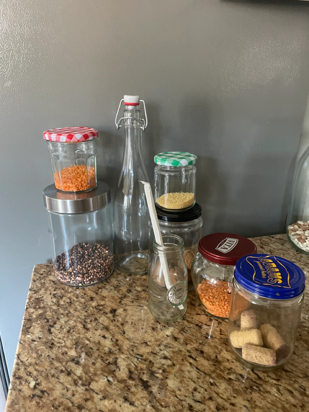 Assorted Glass Jars and Bottle with Lids