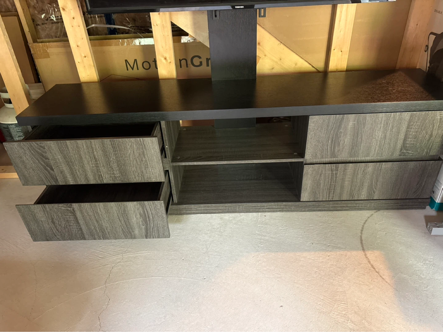 TV stand for TVs up to 80" with mount and storage
