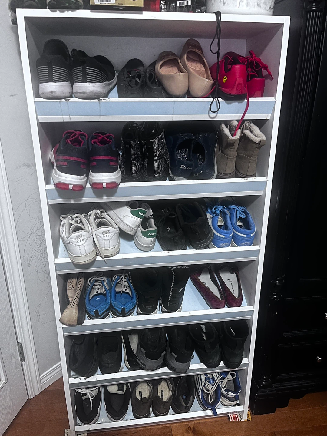 White Shoe Rack with Multiple Shoes