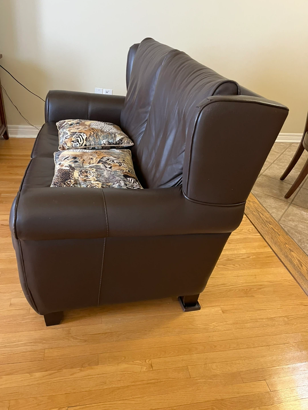 Two Dark Brown Leather Loveseat